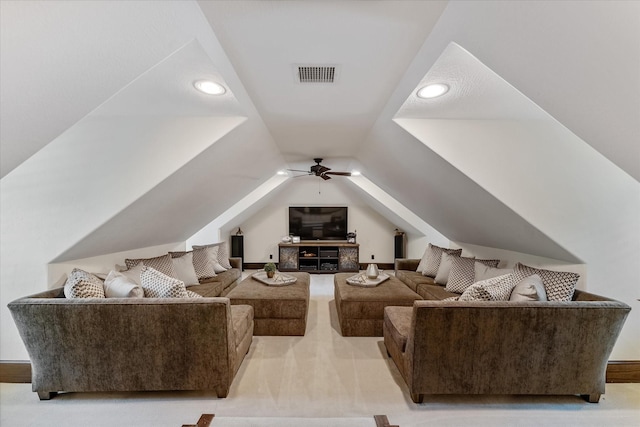 carpeted cinema with ceiling fan and lofted ceiling