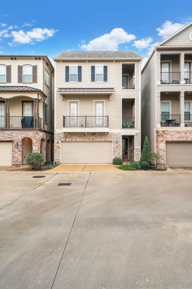 multi unit property featuring a garage