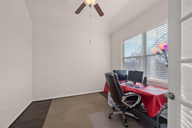 office space featuring dark hardwood / wood-style flooring and ceiling fan