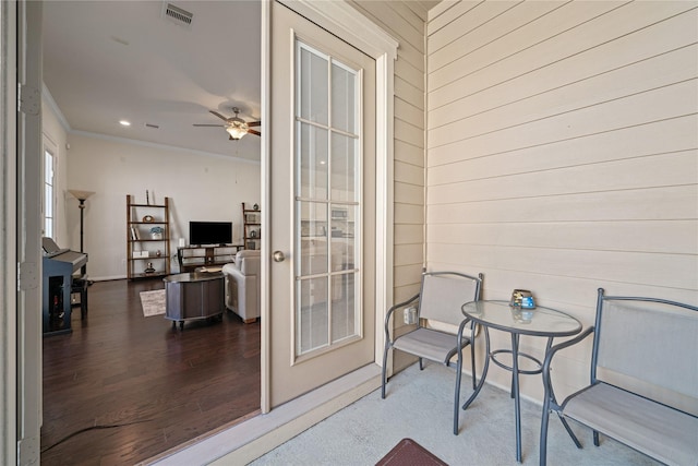 interior space featuring ceiling fan