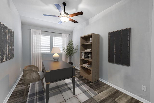 home office with ceiling fan, lofted ceiling, and dark hardwood / wood-style floors