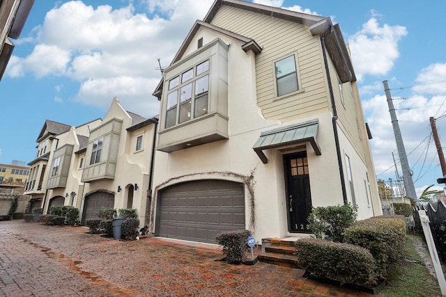 view of property featuring a garage