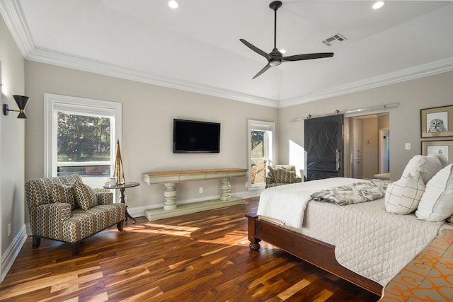 bedroom featuring ceiling fan, dark hardwood / wood-style flooring, a barn door, and ornamental molding