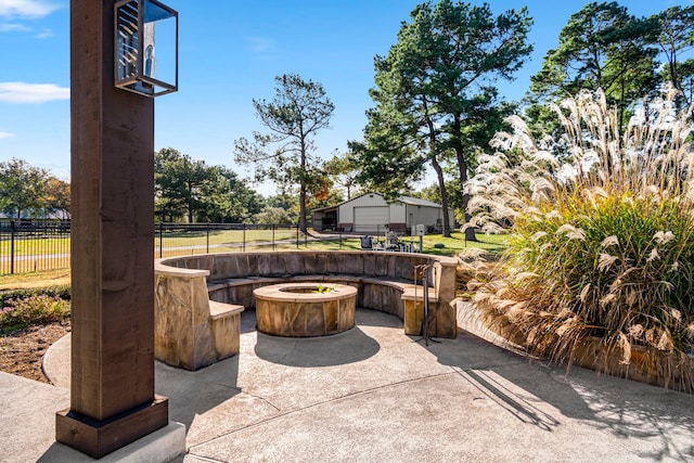 view of patio featuring a fire pit