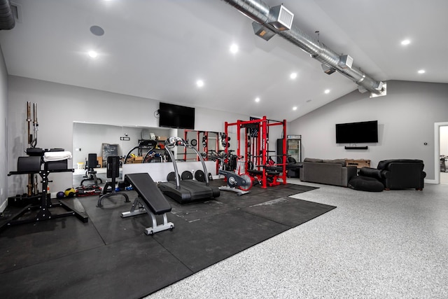 gym featuring vaulted ceiling