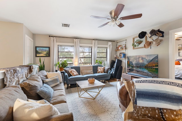 living room with ceiling fan