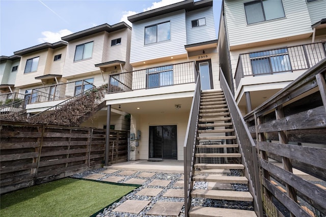 rear view of house featuring a patio area