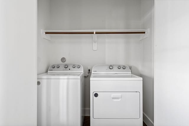 laundry room with washing machine and dryer