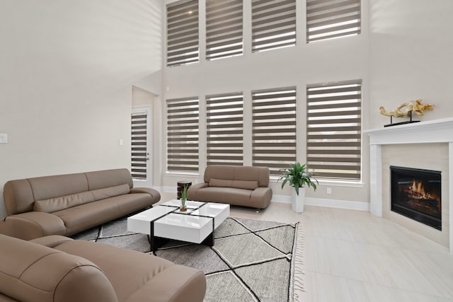 living room with a towering ceiling