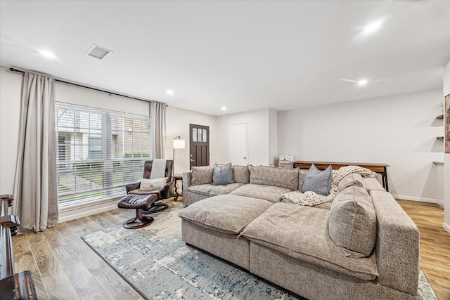 living room featuring light wood-type flooring