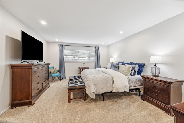 bedroom with light colored carpet