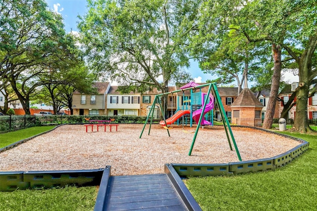 view of playground with a yard