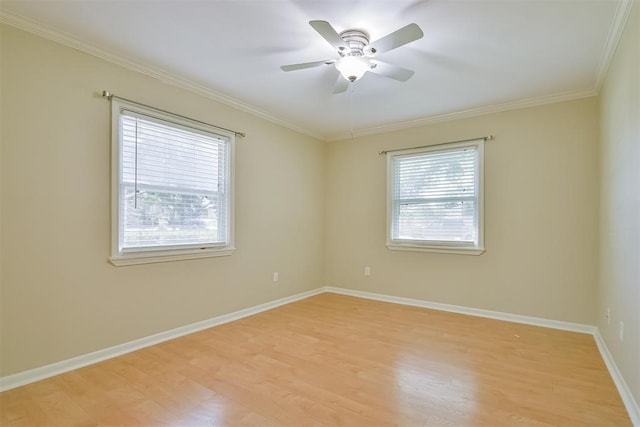 unfurnished room with ceiling fan, crown molding, and light hardwood / wood-style floors