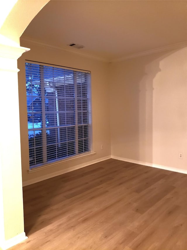 empty room with hardwood / wood-style floors