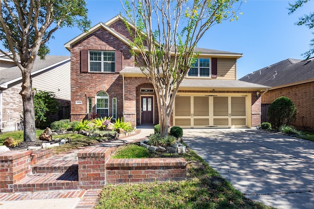 front of property with a garage