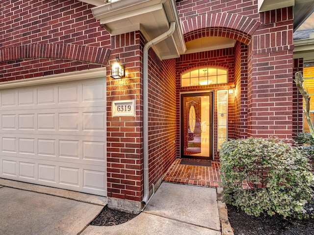 property entrance with a garage