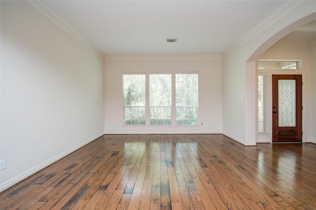 foyer featuring dark hardwood / wood-style flooring and ornamental molding