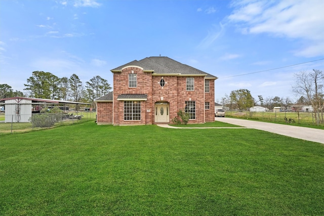 view of front of property with a front lawn