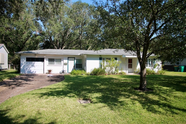 ranch-style house with a garage and a front yard