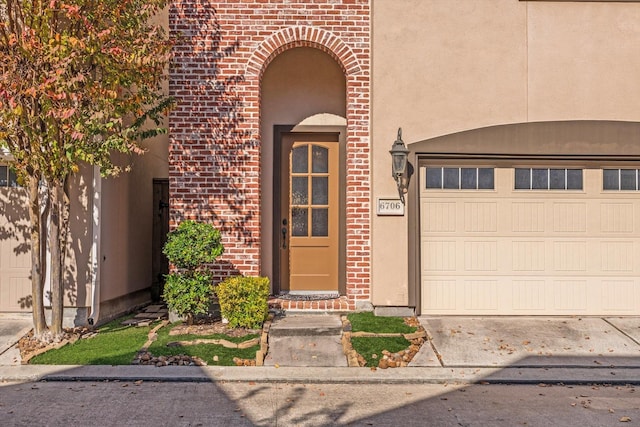 property entrance featuring a garage