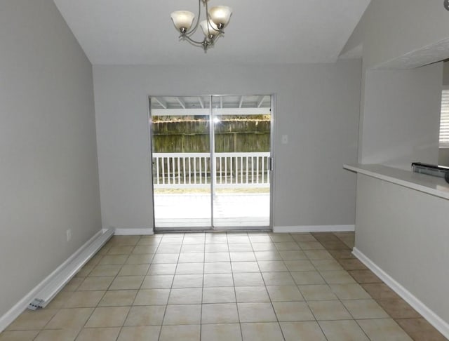 unfurnished dining area with vaulted ceiling, light tile patterned floors, a healthy amount of sunlight, and a notable chandelier