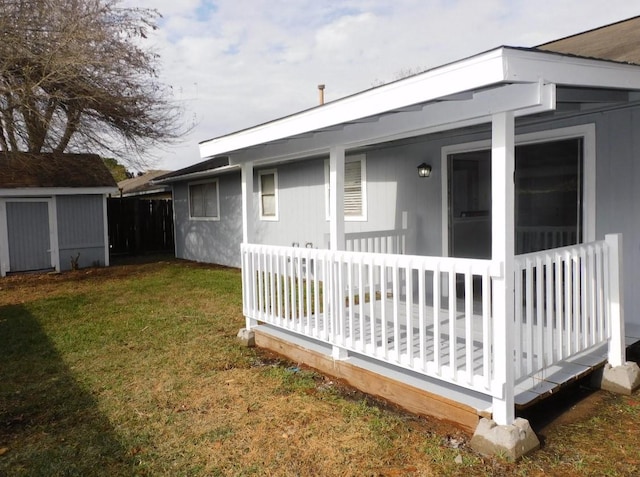 view of property exterior featuring a storage shed and a yard