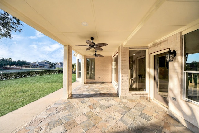 view of patio / terrace featuring ceiling fan