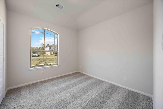 unfurnished room featuring carpet floors