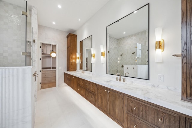 bathroom featuring vanity and walk in shower