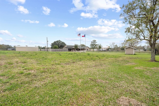 view of yard with a storage shed