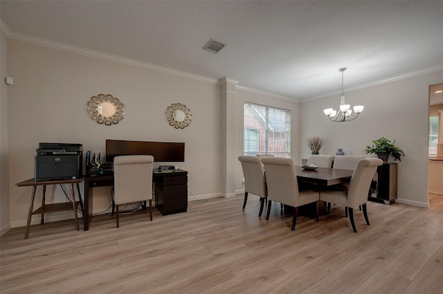 dining room featuring a chandelier, crown molding, and light hardwood / wood-style flooring