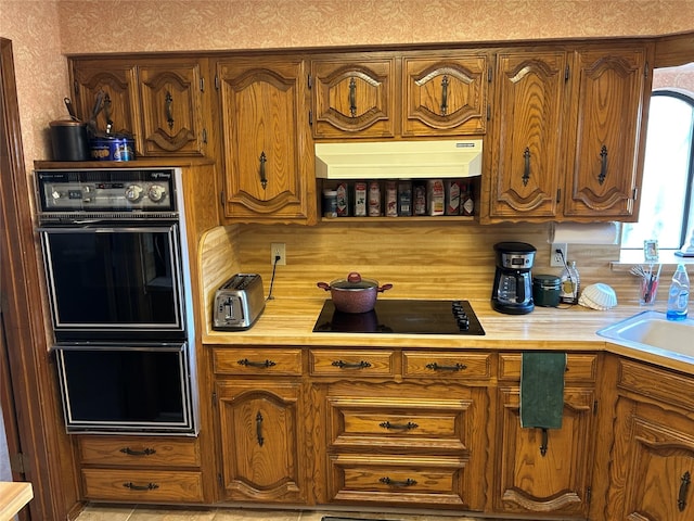 kitchen featuring black appliances