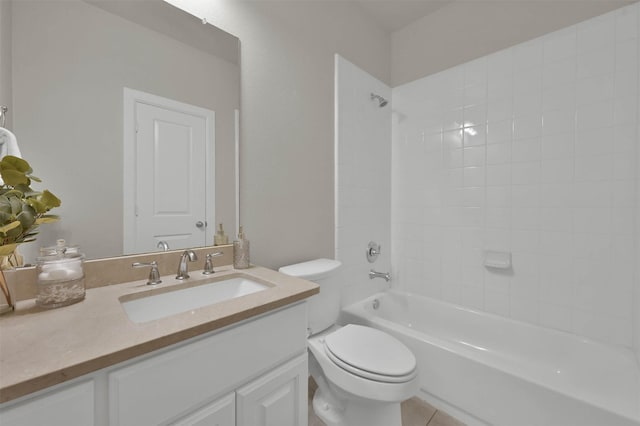 full bathroom with vanity, tiled shower / bath combo, tile patterned floors, and toilet