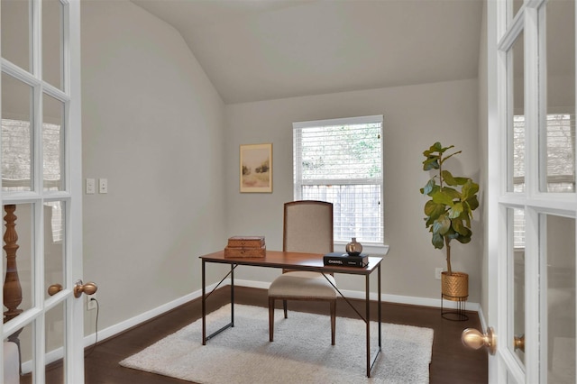 office space featuring french doors, lofted ceiling, and dark hardwood / wood-style flooring