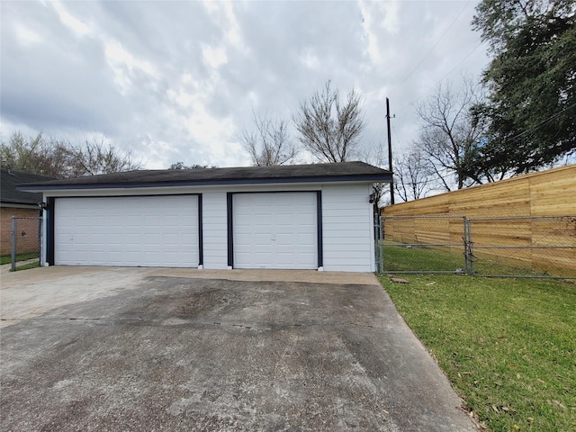 garage with a yard