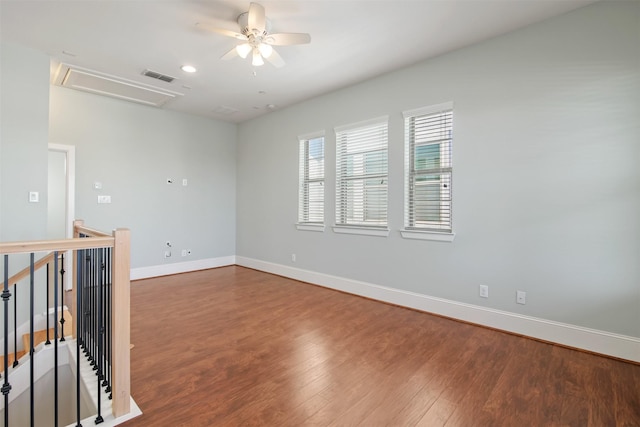 unfurnished room featuring ceiling fan and hardwood / wood-style flooring