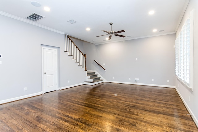 unfurnished living room featuring ceiling fan, crown molding, and dark hardwood / wood-style floors