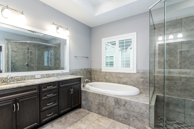 bathroom with vanity, separate shower and tub, and tile patterned flooring