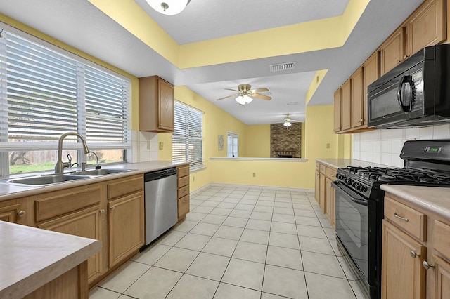 kitchen featuring black appliances, decorative backsplash, sink, ceiling fan, and light tile patterned floors