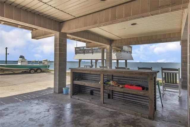 view of patio / terrace with a water view