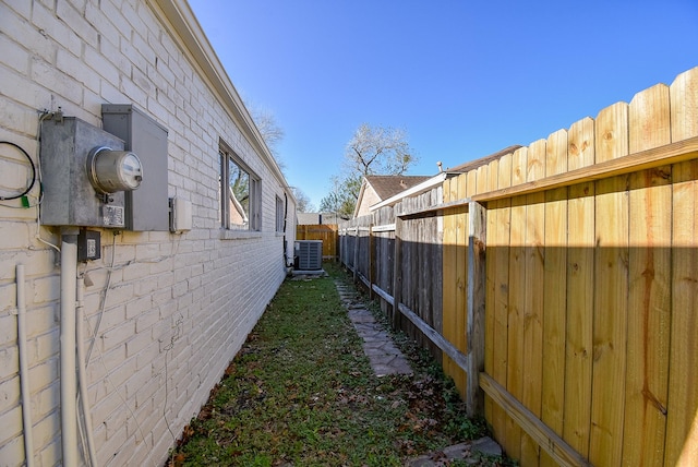 view of yard featuring central AC unit