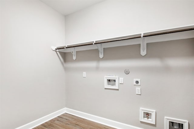 laundry area with washer hookup, hardwood / wood-style floors, gas dryer hookup, and hookup for an electric dryer