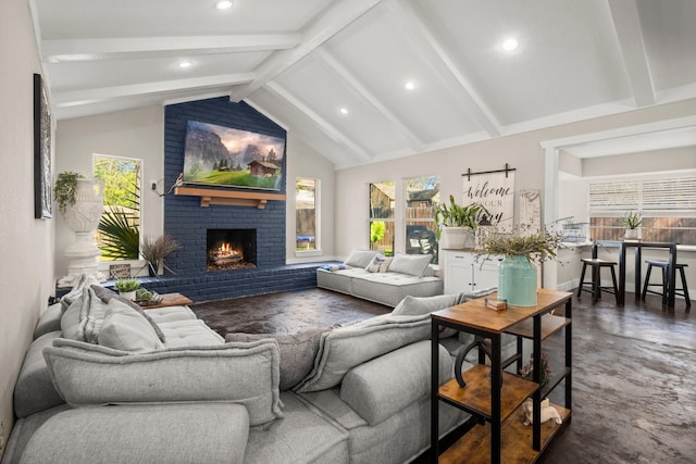 living room with beamed ceiling, a brick fireplace, and high vaulted ceiling