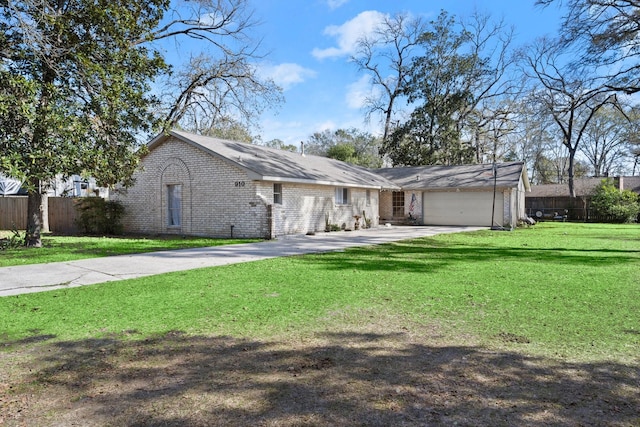 ranch-style house with a garage and a front yard