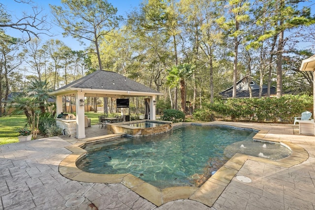 view of swimming pool with an in ground hot tub, a gazebo, and a patio