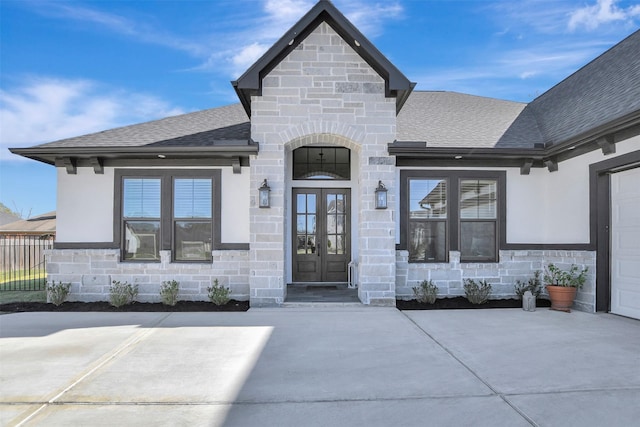 entrance to property featuring french doors