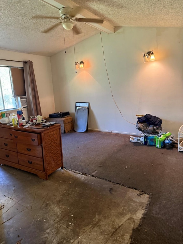 interior space with ceiling fan, a textured ceiling, and lofted ceiling with beams