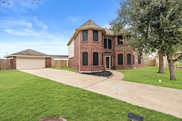 view of front facade with a garage and a front yard