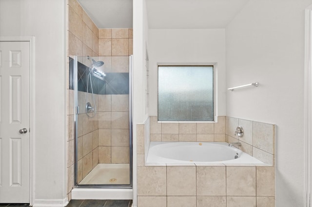 bathroom featuring shower with separate bathtub and tile patterned floors