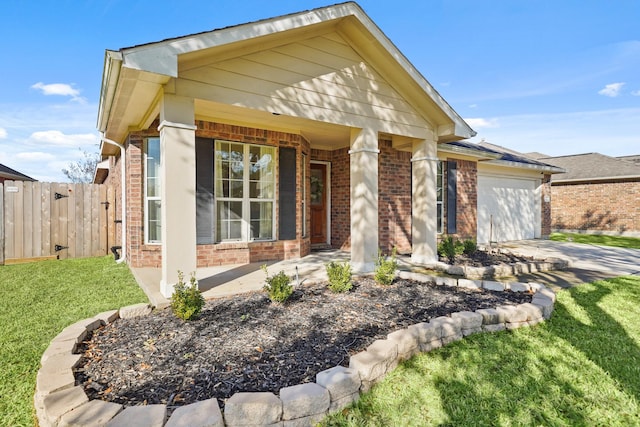 view of front of house with a front lawn and a garage